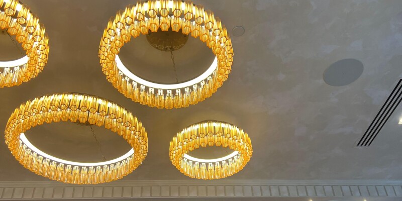 Close up of a venetian plaster ceiling with luxury lighting
