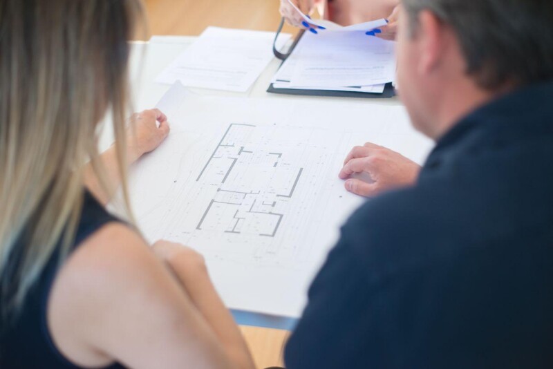 Contractors looking at site plans