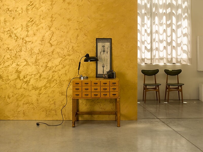 Gold wall painted with Viero Allure textured paint. 